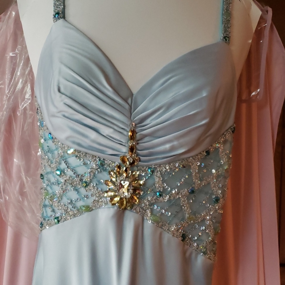 Beautiful light blue, beaded, floor length gown.